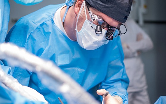 Dentist in Broken Arrow performing surgery