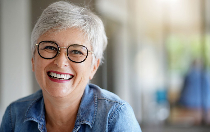 Senior woman with glasses after All-on-4 in Broken Arrow, OK