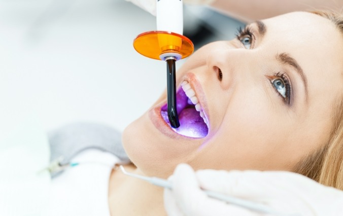 Patient receiving cosmetic dental bonding