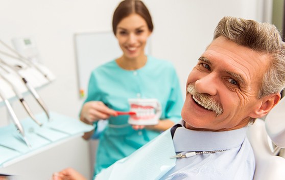 A man enjoying the benefits of dentures in Broken Arrow