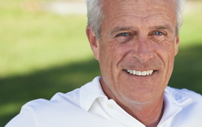 Man sharing smile after tooth extractions