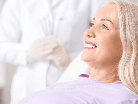 patient smiling about how dental implants work Broken Arrow