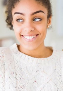 a woman smiling after undergoing cosmetic dentistry near Tulsa