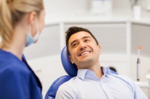 Man in dental chair getting ready to get IV sedation